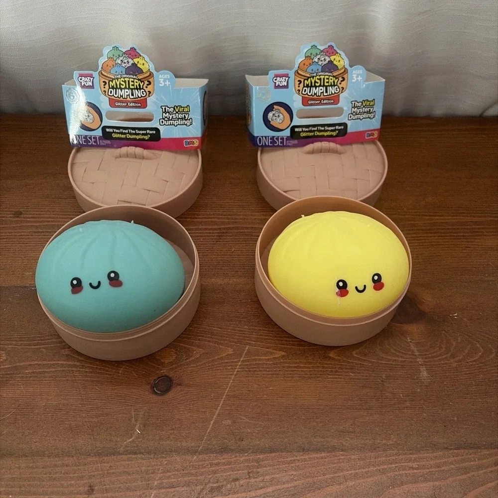 A set of 2 !!! Mystery Dumpling Squishy Bun Viral NEW Sealed Teal & Yellow